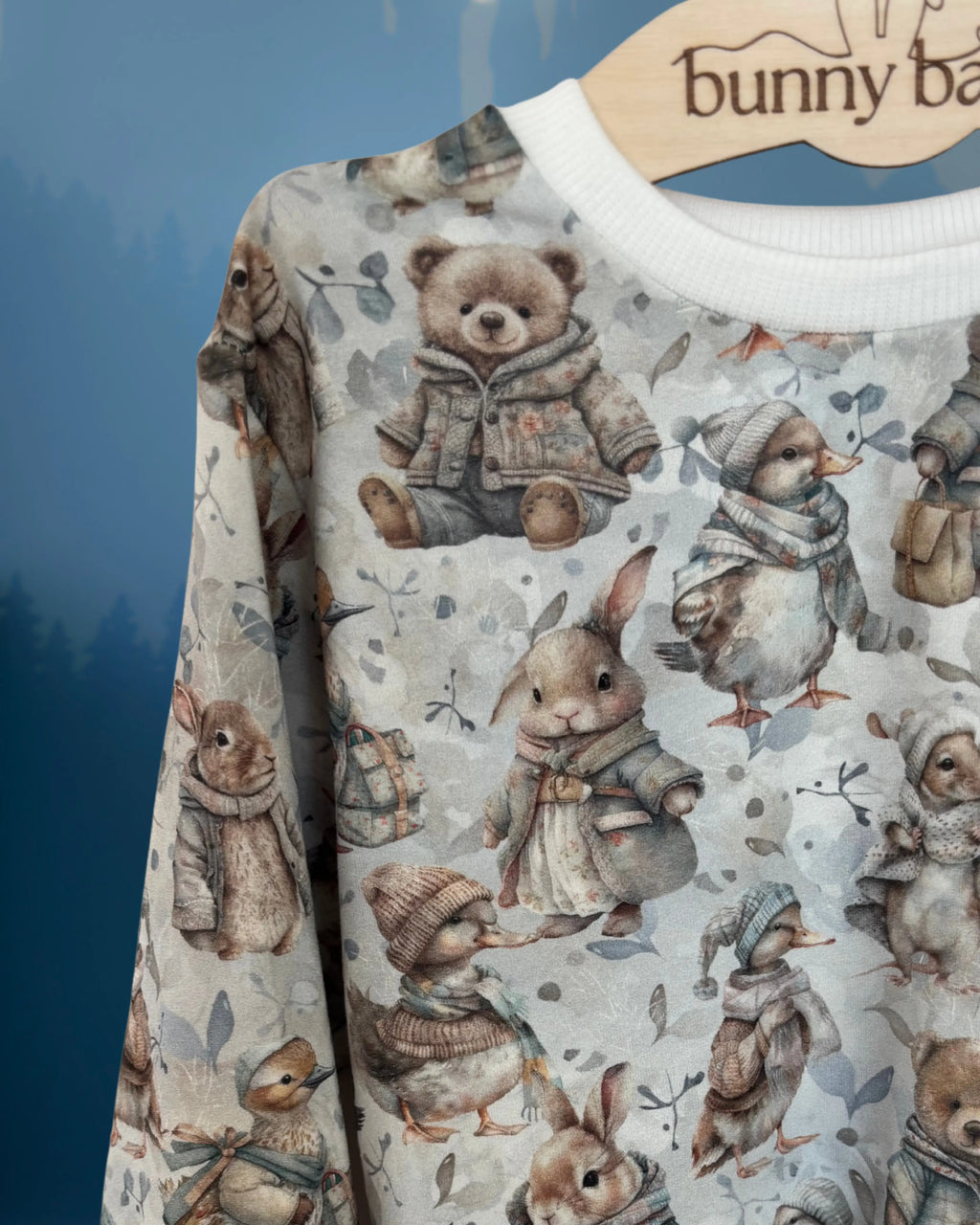 Bluza w zimowe zwierzątka w odcieniach bieli i błękitu - Bunny Baby