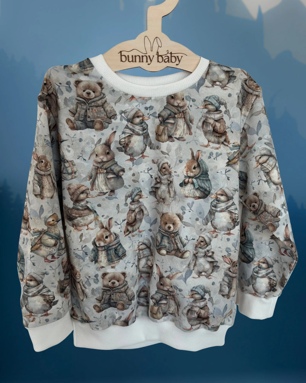 Bluza w zimowe zwierzątka w odcieniach bieli i błękitu - Bunny Baby