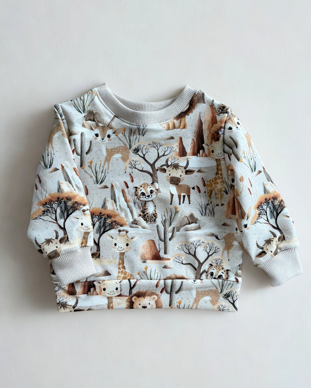 Beżowa bluza w zwierzątka safari