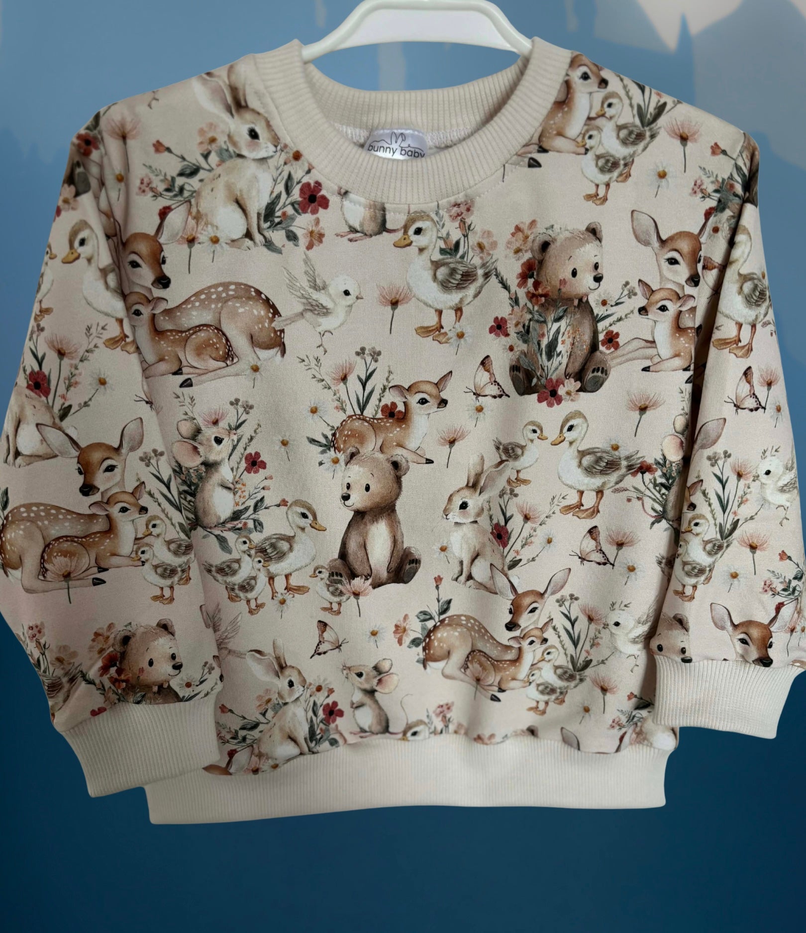 Bluza w wiosenne zwierzątka w pastelowym odcieniu