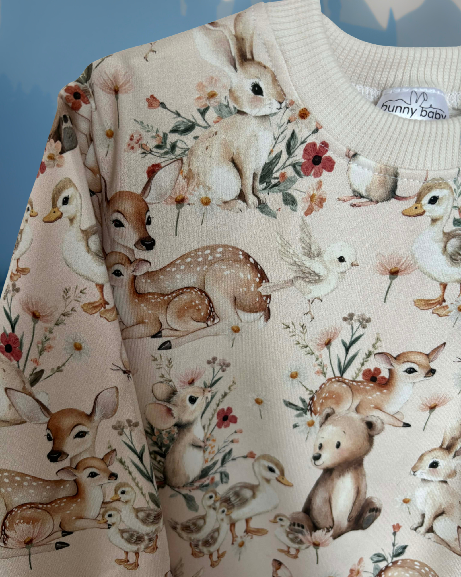 Bluza w wiosenne zwierzątka w pastelowym odcieniu