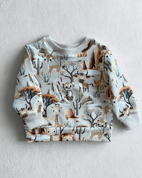 Beżowy komplet dresowy w zwierzątka safari